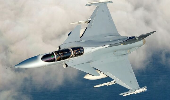 small private jet flying over remote exotic location