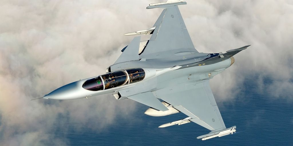 small private jet flying over remote exotic location
