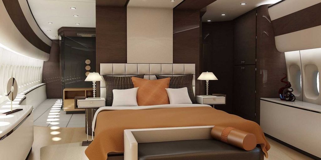 private jet interior with passengers drinking champagne