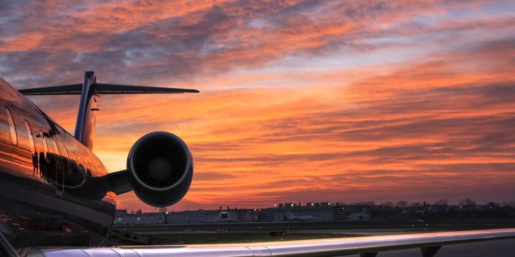 private jet on runway with hidden fees concept