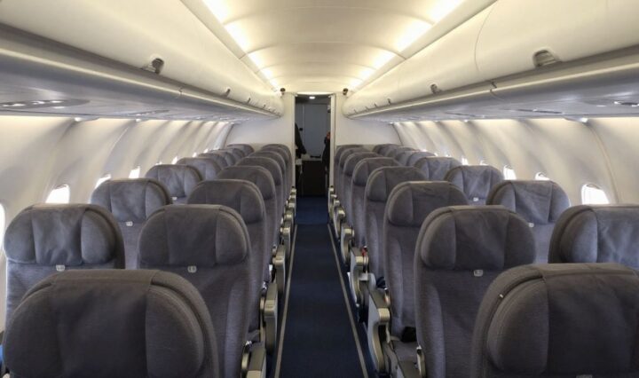 Airplane cabin with comfortable JSX seats.